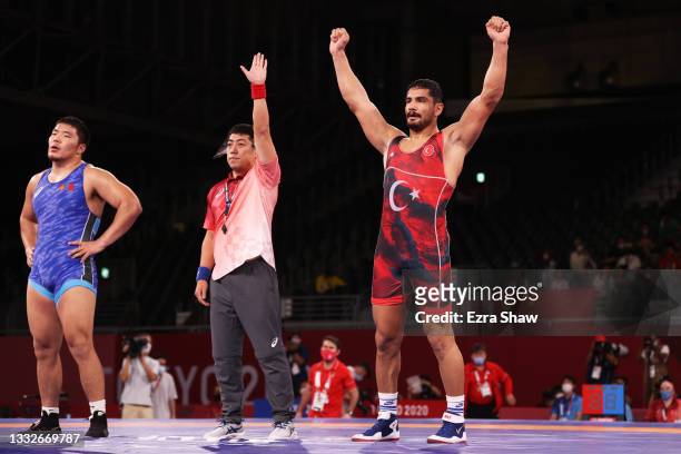 Taha Akgul of Team Turkey celebrates defeating Lkhagvagerel Munkhtur of Team Mongolia during the Men’s Freestyle 125kg Bronze Medal Match on day...