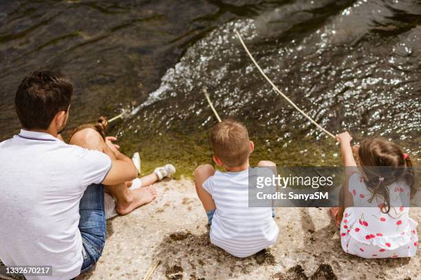 fishing with my family - bosnia and hercegovina stock pictures, royalty-free photos & images