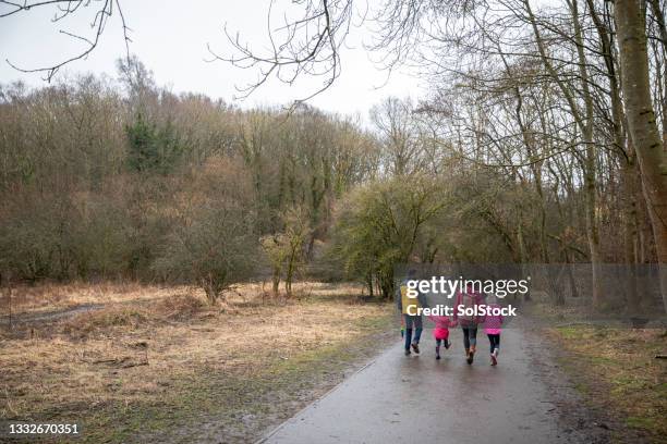 healthy activities in fresh air - black boots back view stock pictures, royalty-free photos & images