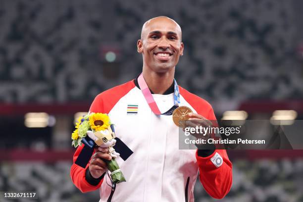 Gold medalist Damian Warner of Team Canada stands on the podium during the medal ceremony for the Men's Decathlon on day fourteen of the Tokyo 2020...