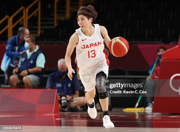 Rui Machida of Team Japan brings the ball up court against Team France during the second half of a Women's Basketball Semifinals game on day fourteen...