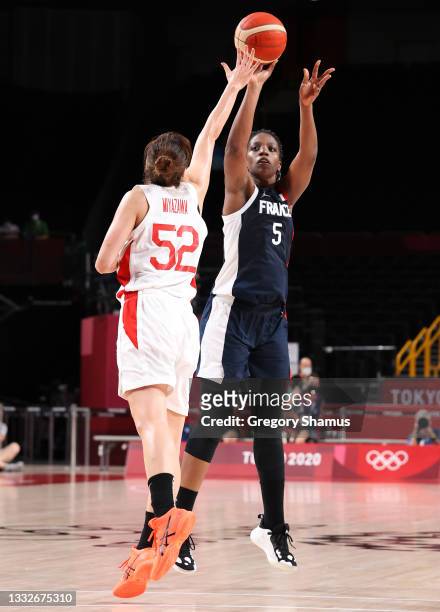 Endene Miyem of Team France shoots against Yuki Miyazawa of Team Japan during the second half of a Women's Basketball Semifinals game on day fourteen...