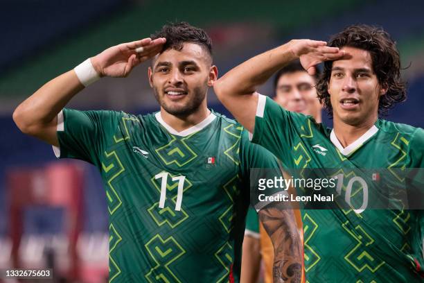 Alexis Vega of Team Mexico celebrates with Diego Lainez after scoring their side's third goal during the Men's Bronze Medal Match between Mexico and...