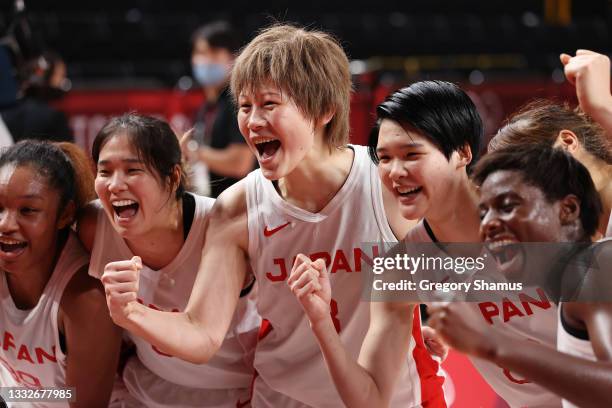 Team Japan celebrates their win in a Women's Basketball Semifinals game against France on day fourteen of the Tokyo 2020 Olympic Games at Saitama...
