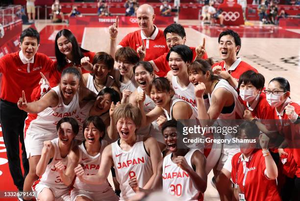 Team Japan celebrates following their victory over Team France in a Women's Basketball Semifinals game on day fourteen of the Tokyo 2020 Olympic...