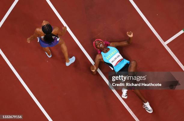 Shaunae Miller-Uibo of Team Bahamas reacts after winning the gold medal in the Women's 400m Final on day fourteen of the Tokyo 2020 Olympic Games at...