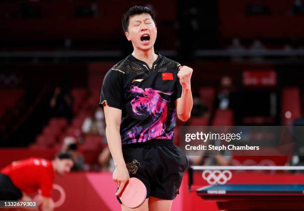 Ma Long of Team China reacts during his Men's Team Gold Medal table tennis match on day fourteen of the Tokyo 2020 Olympic Games at Tokyo...