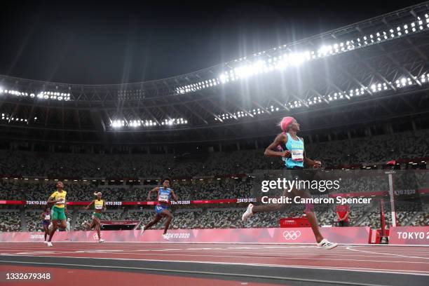 Shaunae Miller-Uibo of Team Bahamas reacts as she crosses the finish line winning the gold medal in the Women's 400m Final on day fourteen of the...