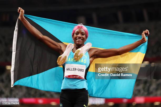 Shaunae Miller-Uibo of Team Bahamas celebrates after winning the gold medal in the Women's 400m Final on day fourteen of the Tokyo 2020 Olympic Games...