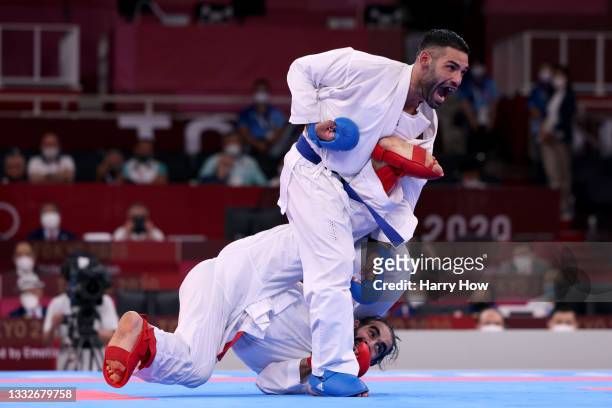 Luigi Busa of Team Italy competes against Rafael Aghayev of Team Azerbaijan during the Men’s Karate Kumite -75kg Gold Medal Bout on day fourteen of...