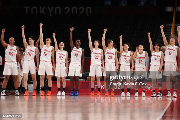 Team Japan celebrates following their victory over Team France in a Women's Basketball Semifinals game on day fourteen of the Tokyo 2020 Olympic...