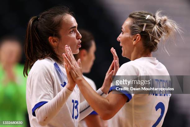 Anna Vyakhireva of Team ROC celebrates with teammate Polina Kuznetsova after scoring a goal during the Women's Semifinal handball match between...