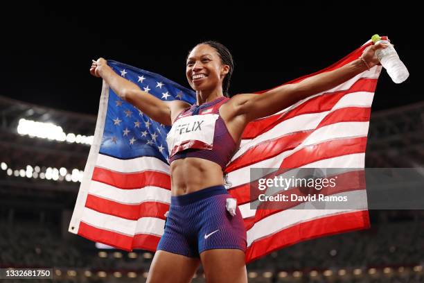 Allyson Felix of Team USA reacts after winning the bronze medal in the Women's 400m Final on day fourteen of the Tokyo 2020 Olympic Games at Olympic...