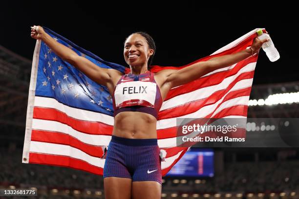 Allyson Felix of Team USA reacts after winning the bronze medal in the Women's 400m Final on day fourteen of the Tokyo 2020 Olympic Games at Olympic...