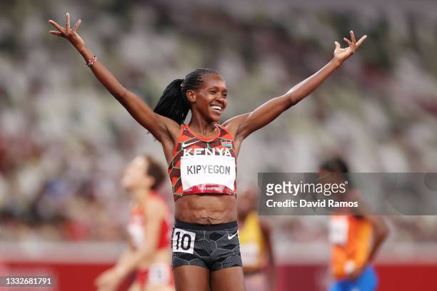 Faith Kipyegon of Team Kenya reacts after winning the gold medal during the Women's 1500 metres final on day fourteen of the Tokyo 2020 Olympic Games...