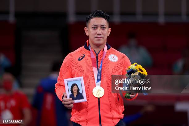 Gold medalist Ryo Kiyuna of Team Japan poses with the gold medal for the Men’s Karate Kata on day fourteen of the Tokyo 2020 Olympic Games at Nippon...