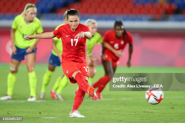 Jessie Fleming of Team Canada scores their team's first goal from the penalty spot during the Women's Gold Medal Match between Canada and Sweden on...