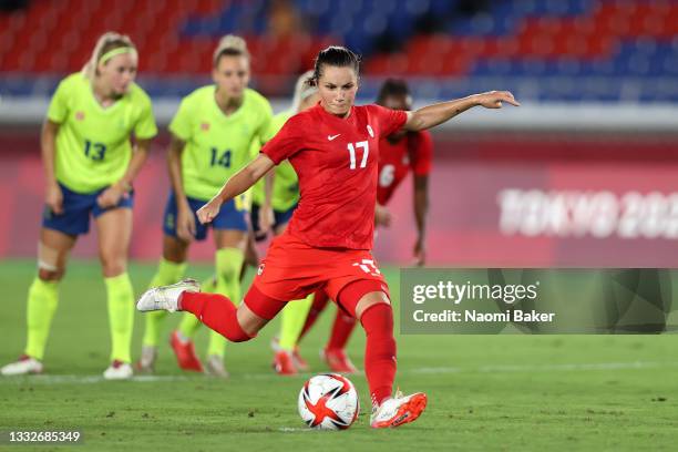 Jessie Fleming of Team Canada scores their side's first goal from the penalty spot during the Women's Gold Medal Match between Canada and Sweden on...