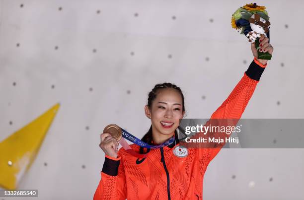Akiyo Noguchi of Team Japan poses with the bronze medal for Sport Climbing Women's Combined after during the Sport Climbing Women's Combined Final on...