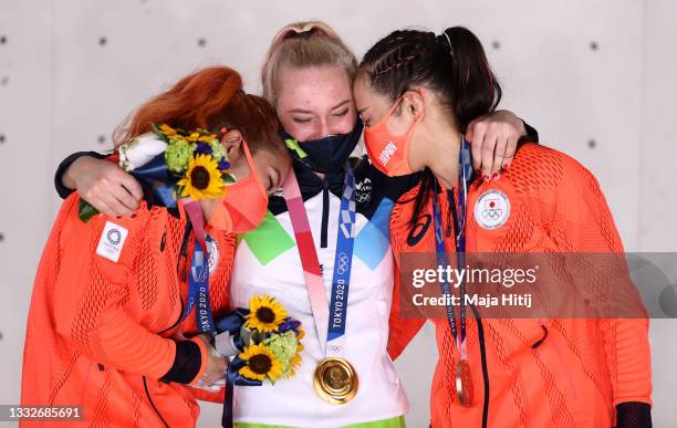 Silver medalist Miho Nonaka of Team Japan, gold medalist Janja Garnbret of Team Slovenia, and bronze medalist Akiyo Noguchi of Team Japan, pose on...