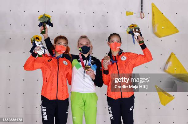 Silver medalist Miho Nonaka of Team Japan, gold medalist Janja Garnbret of Team Slovenia, and bronze medalist Akiyo Noguchi of Team Japan, pose on...