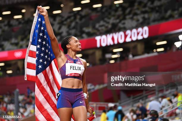 Allyson Felix of Team USA reacts after winning the bronze medal in the Women's 400m Final on day fourteen of the Tokyo 2020 Olympic Games at Olympic...