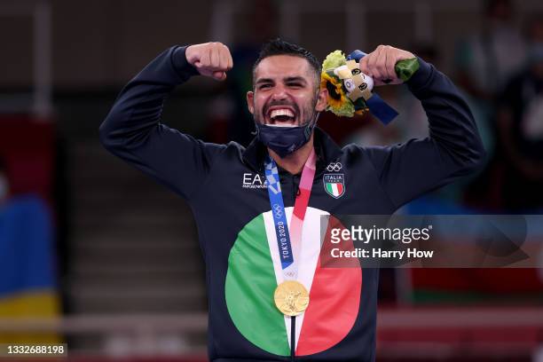 Gold medalist Luigi Busa of Team Italy poses with the gold medal for the Men’s Karate Kumite -75kg on day fourteen of the Tokyo 2020 Olympic Games at...