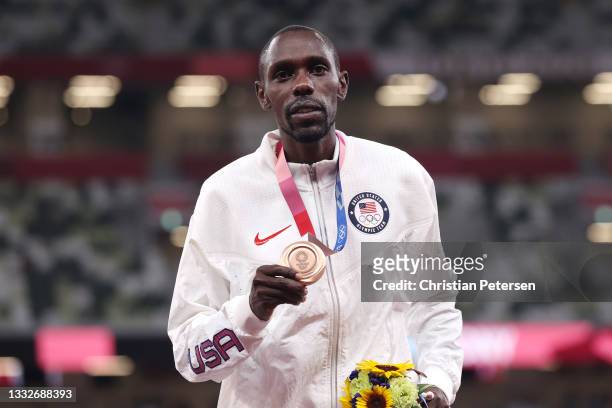 Bronze medalist Paul Chelimo of Team United States stands on the podium during the medal ceremony for the Men's 5000m final on day fourteen of the...