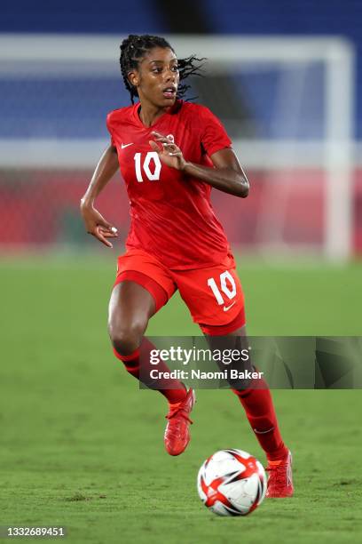 Ashley Lawrence of Team Canada runs with the ball during the Women's Gold Medal Match between Canada and Sweden on day fourteen of the Tokyo 2020...