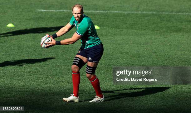 Alun Wyn Jones passes the ball during the British & Irish Lions captain's run at Cape Town Stadium on August 06, 2021 in Cape Town, South Africa.