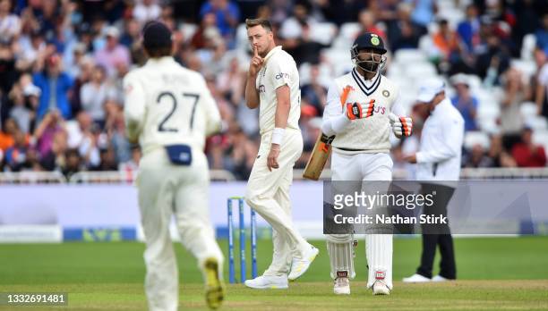 Ollie Robinson of England celebrates after he gets Ravindra Jadeja of India out during day three of the First Test Match between England and India at...