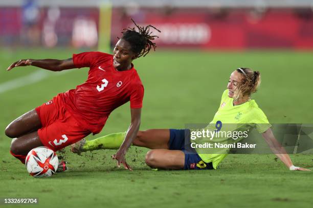 Kadeisha Buchanan of Team Canada is challenged by Kosovare Asllani of Team Sweden during the Women's Gold Medal Match between Canada and Sweden on...