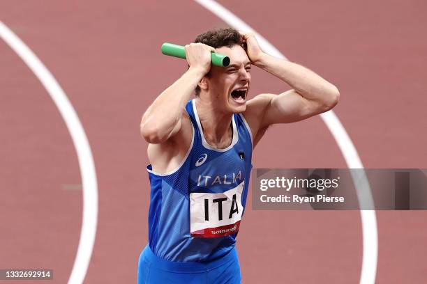 Filippo Tortu of Team Italy celebrates after winning the gold medal in the Men's 4 x 100m Relay Final on day fourteen of the Tokyo 2020 Olympic Games...