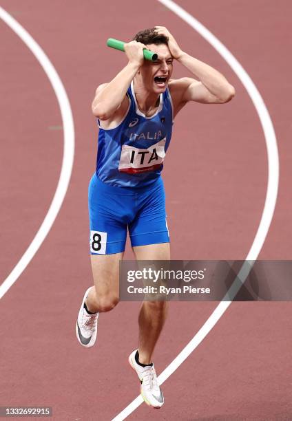 Filippo Tortu of Team Italy celebrates after winning the gold medal in the Men's 4 x 100m Relay Final on day fourteen of the Tokyo 2020 Olympic Games...