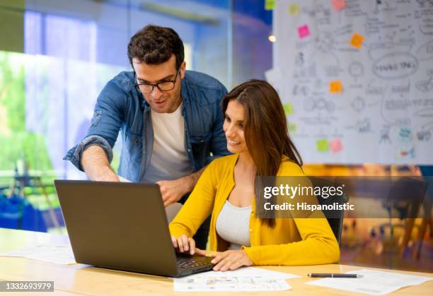 team of designers working together at a creative office - marketing small business stock pictures, royalty-free photos & images