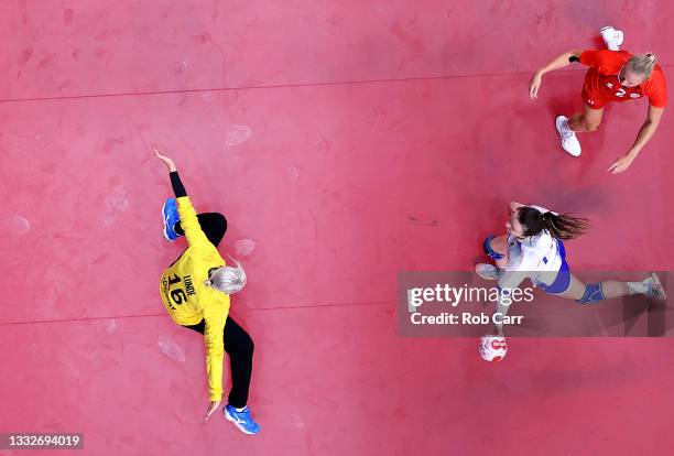 Anna Vyakhireva of Team ROC shoots at goal as Katrine Lunde of Team Norway looks to save during the Women's Semifinal handball match between Norway...