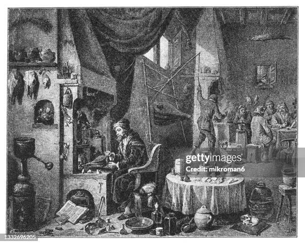 an alchemist in his laboratory by david teniers the younger - alchemist ストックフォトと画像