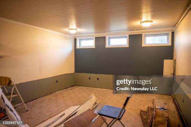 Long Island couple's basement being repaired from water damage during a recent flooding on July 27, 2021 in Northport, New York.