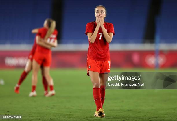 Julia Grosso of Team Canada celebrates following their team's victory in the penalty shoot out in the Women's Gold Medal Match between Canada and...