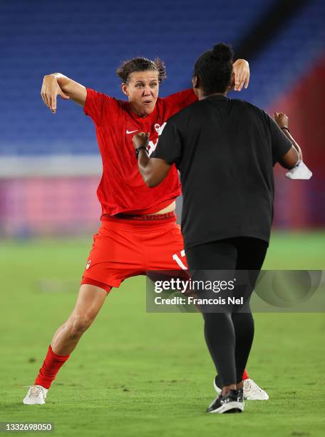 Christine Sinclair of Team Canada celebrates following their team's victory in the penalty shoot out in the Women's Gold Medal Match between Canada...