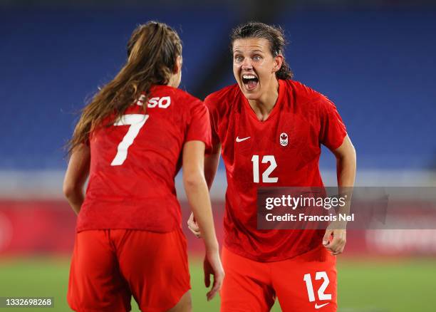 Christine Sinclair of Team Canada celebrates with Julia Grosso following their team's victory in the penalty shoot out in the Women's Gold Medal...