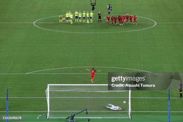 Julia Grosso of Team Canada celebrates scoring the winning penalty in the penalty shoot out during the Women's Gold Medal Match between Canada and...