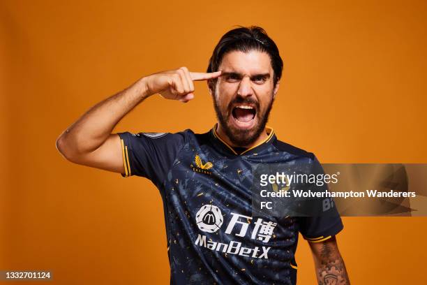 Ruben Neves of Wolverhampton Wanderers poses for a portrait in the 2021/22 Away Kit on Wolverhampton Wanderers Media Day at Molineux on August 03,...