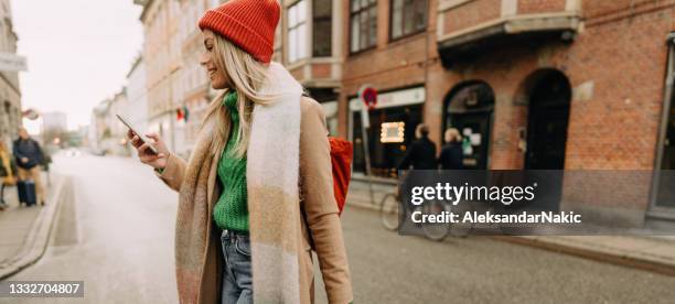 using mobile phone while traveling - copenhagen map stock pictures, royalty-free photos & images