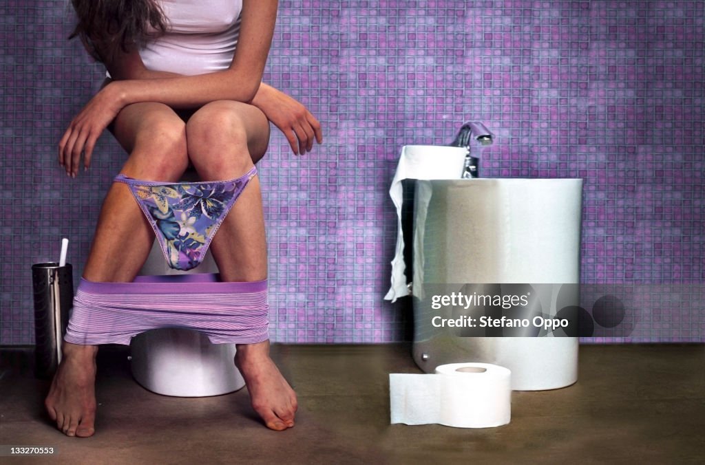 Woman in the toilet