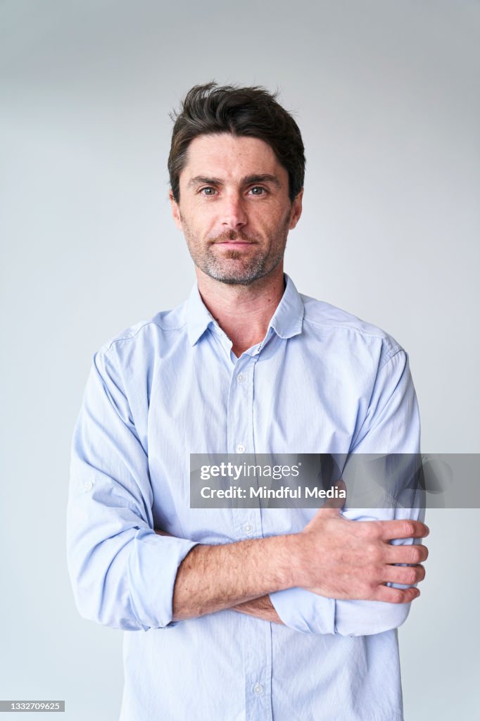 Portrait of smiling handsome mid adult man