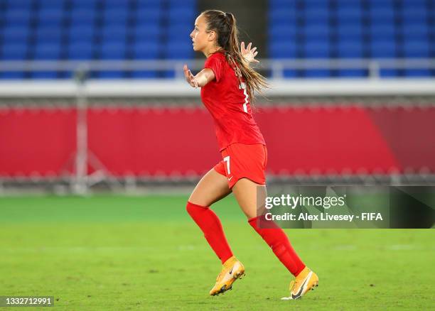 Julia Grosso of Team Canada celebrates after scoring their team's winning penalty in the shootout during the Women's Gold Medal Match between Canada...