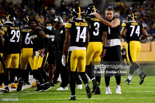 Chase Claypool and Dwayne Haskins of the Pittsburgh Steelers celebrate a touchdown in the second half during the 2021 NFL preseason Hall of Fame Game...