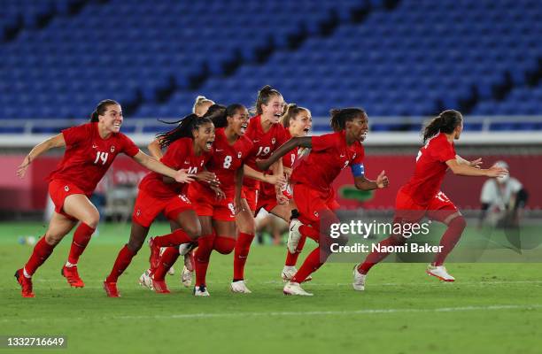 Players of Team Canada celebrate following their team's victory in the penalty shoot out in the Women's Gold Medal Match between Canada and Sweden on...