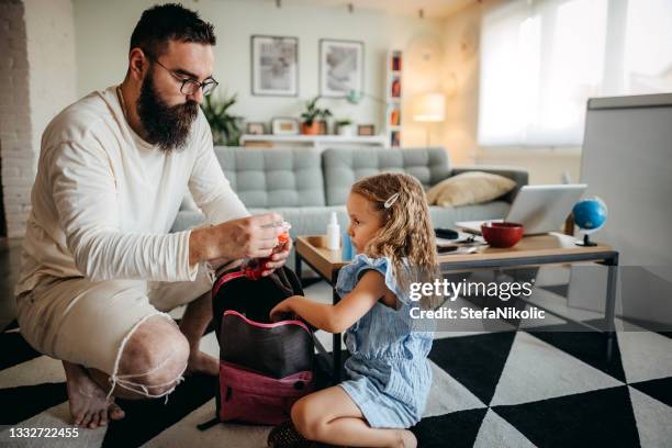 getting ready - packing backpack stock pictures, royalty-free photos & images